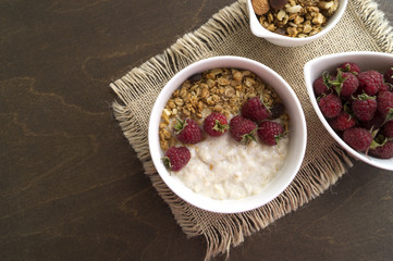 Healthy Breakfast. Oatmeal in a white bowl