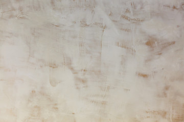 Old yellow stucco wall texture background