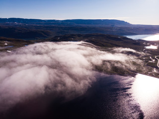 Clouds over lake water, Hardangervidda landscape, Norway