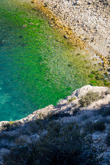 Jebha island and waves and rocks