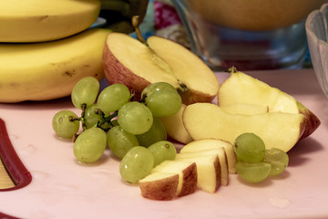 Different fresh fruits as ingredients for the vegan and healthy cuisine.