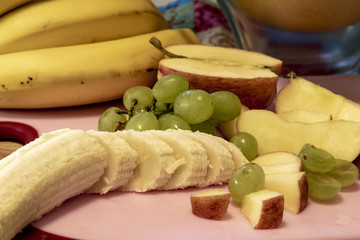 Different fresh fruits as ingredients for the vegan and healthy cuisine.
