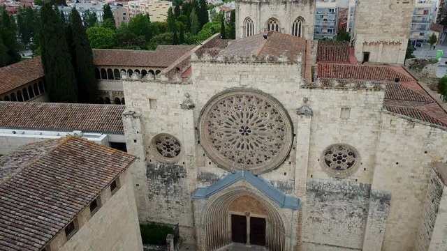 View from drone of ancient Benedictine abbey in Sant Cugat del Valles, Catalonia, Spain
