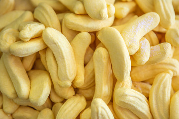Yellow Banana Shaped Jelly Sweets In Candy Shop. Colorful Candies Background Or Texture.