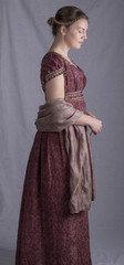 Regency woman in paisley shawl in profile