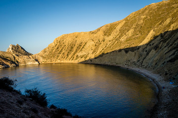 Jebha island and waves and rocks