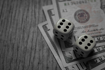 Ten Dollar Bills and game dice