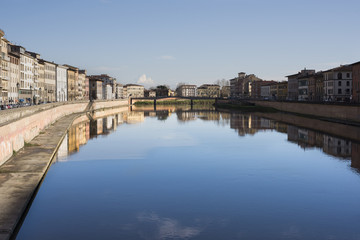 Fototapeta na wymiar view on the Ponte di Mezzo on the Arno river, Pisa by day