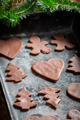 Preparation for baking Christmas gingerbread cookies on baking tray