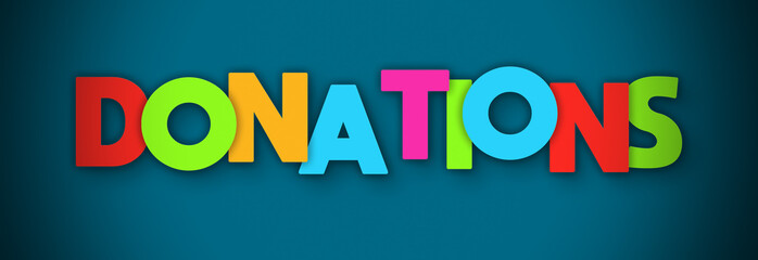 Donations - overlapping multicolor letters written on blue background