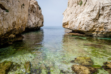 Fototapeta na wymiar Jebha Playa monica beach and waves and rocks