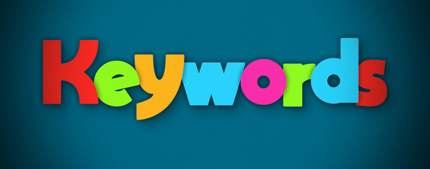 Keywords - overlapping multicolor letters written on blue background