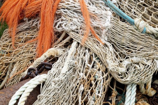 Fishing nets, rusty chains and ropes