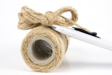 Twine for packaging parcels and a sharp knife. Cable for binding parcels sent by post.