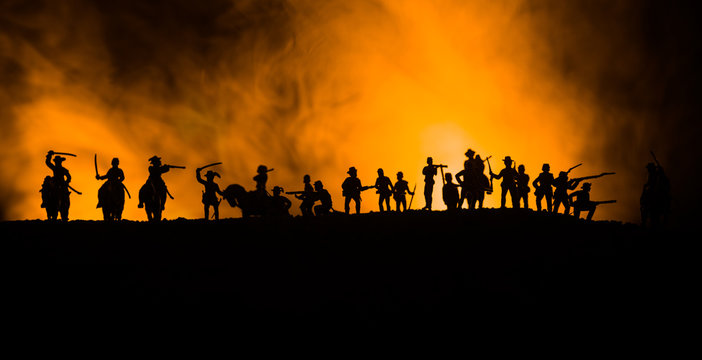 American Civil War Concept. Military silhouettes fighting scene on war fog sky background. Attack scene.