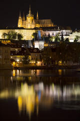 Fototapeta na wymiar Prague gothic Castle with the Lesser Town above River Vltava in the Night, Czech Republic