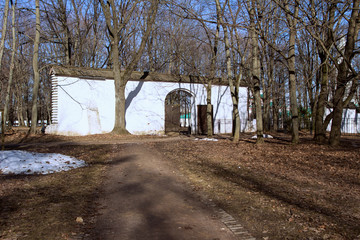 Garden gates of a former royal estate in early spring. Sightseeing and museums of Russia....
