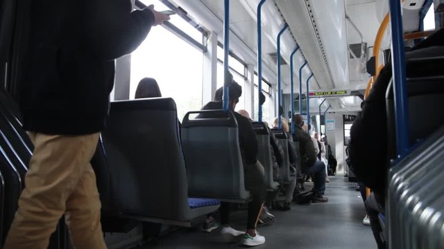 Passengers traveling in Amsterdam tram