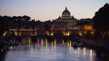 Fototapeta na wymiar Clear twilight scene of Sant Angelo Bridge across Tiber River near Vatican City