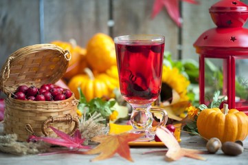 hot winter or autumn drink with spices and wild rose berries, mulled wine, hot wine