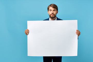 man holding white sheet of paper blank place free