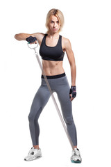 fitness girl pulling steel spring expander isolated on white background, full length
