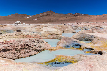 Unique landscape scenario in Bolivia, arid place around the geysers, feeling like to be in another...