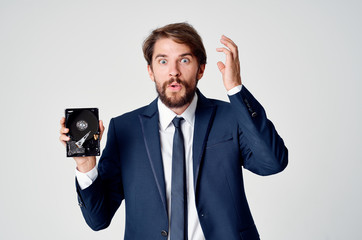 surprised man with hard drive technology