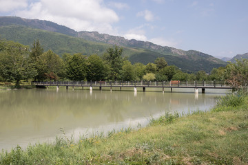Fototapeta premium Landscape with misty morning fog in the Forest Lake or Beautiful forest lake in the morning at winter time. Azerbaijan nature. Caucasus.