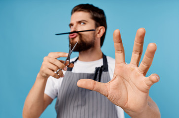 man with comb scissors barber shop