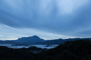 Fototapeta na wymiar Majestic Beautiful Mount Kinabalu with Sea of cloud at Sabah Borneo