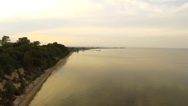 Drone footage of polish coast of Baltic Sea (Morze Baltyckie) during the sunset at klif Mechelinki Poland