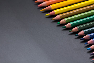 color pencils on black background close up