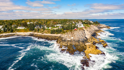 Aerial view of Pemaquid Point Light. The Pemaquid Point Light is a historic US lighthouse located...