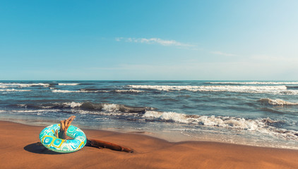 Lifebuoy on the shore, summer vacation on the beach