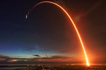 Missile launch at night. The elements of this image furnished by NASA. - Powered by Adobe