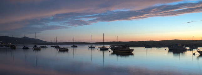 Fototapeta premium Sunset over Morro Bay Harbor on the central California coast in California United States