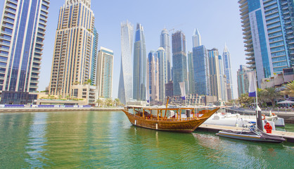 Fototapeta na wymiar boats and modern buildings in Dubai Marina, United Arab Emirates