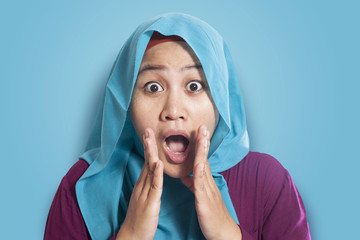 Shocked Asian Muslim Woman With Mouth Opened