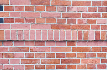 Fototapeta premium Red bricks wall background. Wall of old building useful as backdrop 