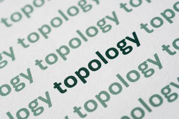 word topology printed on paper macro