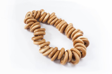 Bagels on rope, isolated on white background
