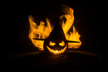 Halloween concept. Jack-o-lantern smile and scary eyes for party night. Close up view of scary...