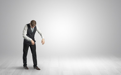 Zombi, sleepy maniac businessman walking in a copy space
