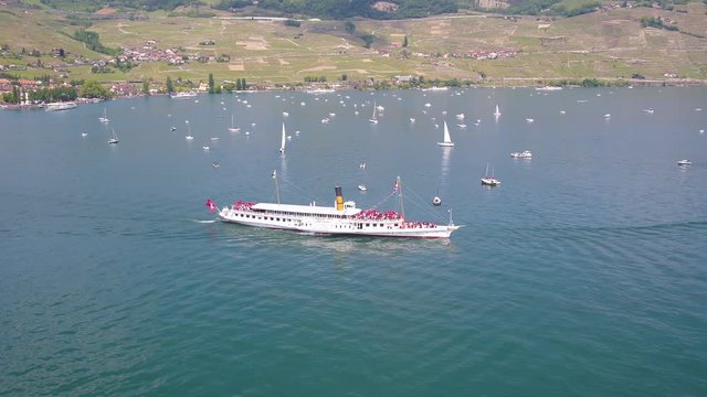 Aerial shot of Belle Epoque boat on lake L&radic;&copy;man in front of Cully, Lavaux, Switzerland
Shot during special naval parade