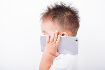 Asian portrait child boys 1 year 6 months calling with smartphone