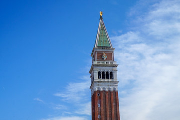 Fototapeta na wymiar A bell tower in the sky (St Mark's Campanile in Venice)