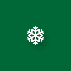 Christmas snowflake icon and sign design on red and green background
