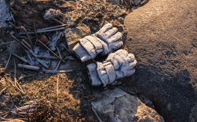 frozen gloves on the rock
