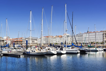 Fototapeta na wymiar Coruna marina port with sailboats and cruiser , Spain